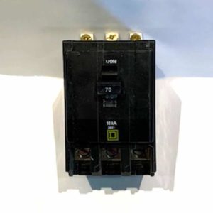 A black QOB370 circuit breaker